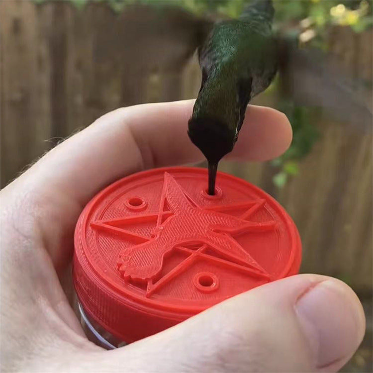 Hand Held Humming Bird Feeder